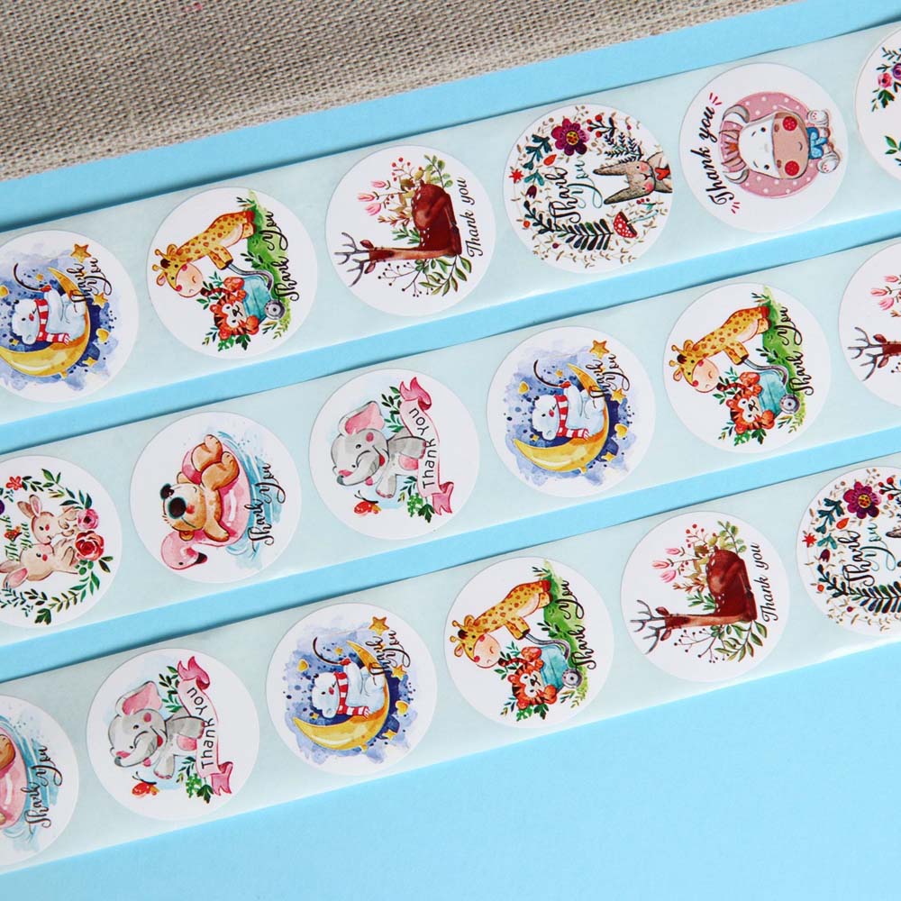 Наклейки "животные" 500шт. в рулоне