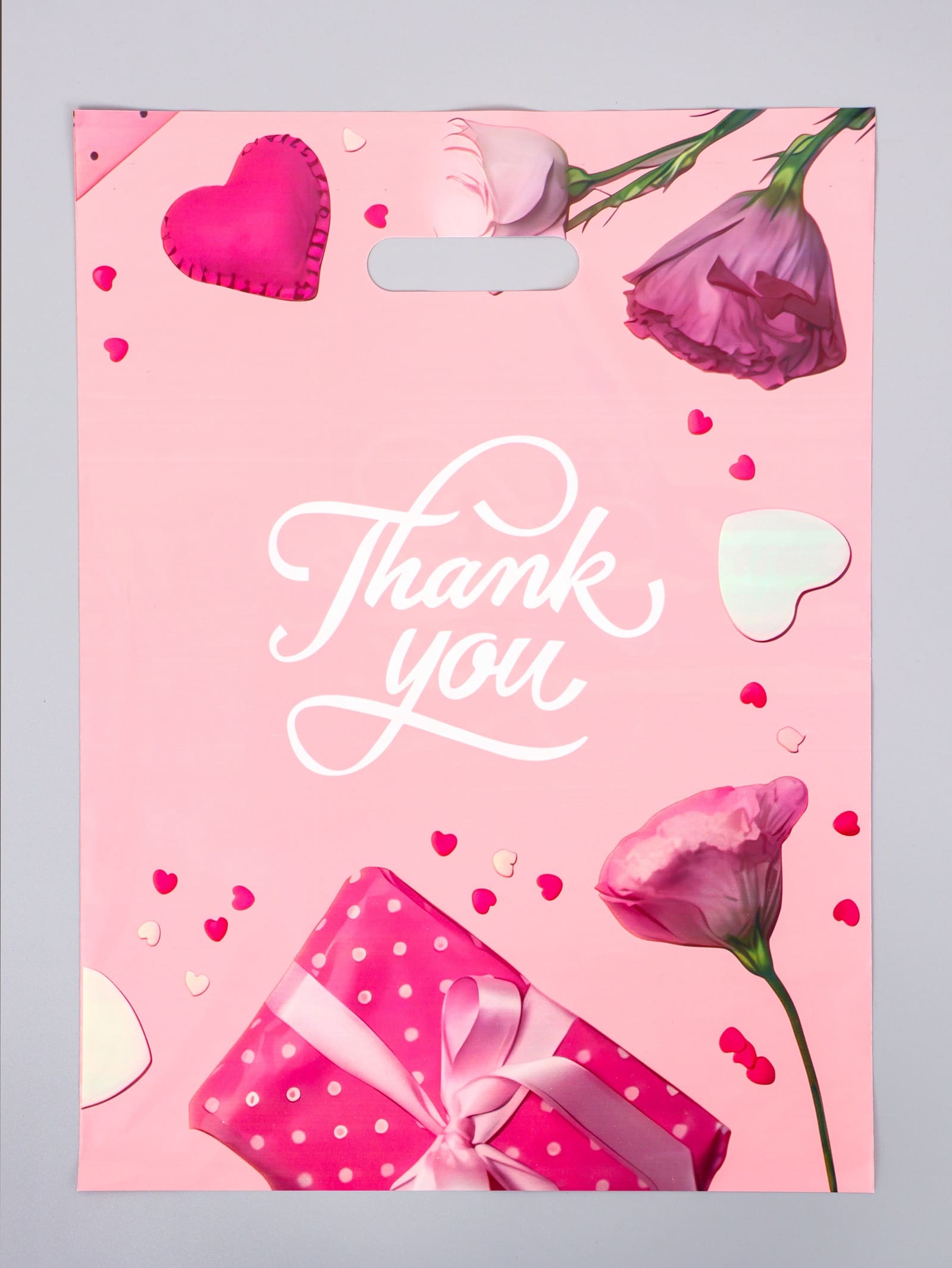 Пакет универсальный 30х40см "бант" проруб.ручка 60мкм